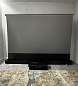 Моторизованный напольный ALR экран Global Screen OFM-100 124*221 Black Code UST 0.5 Perfo (Sale из шоу-рума с дефектом натяжения)